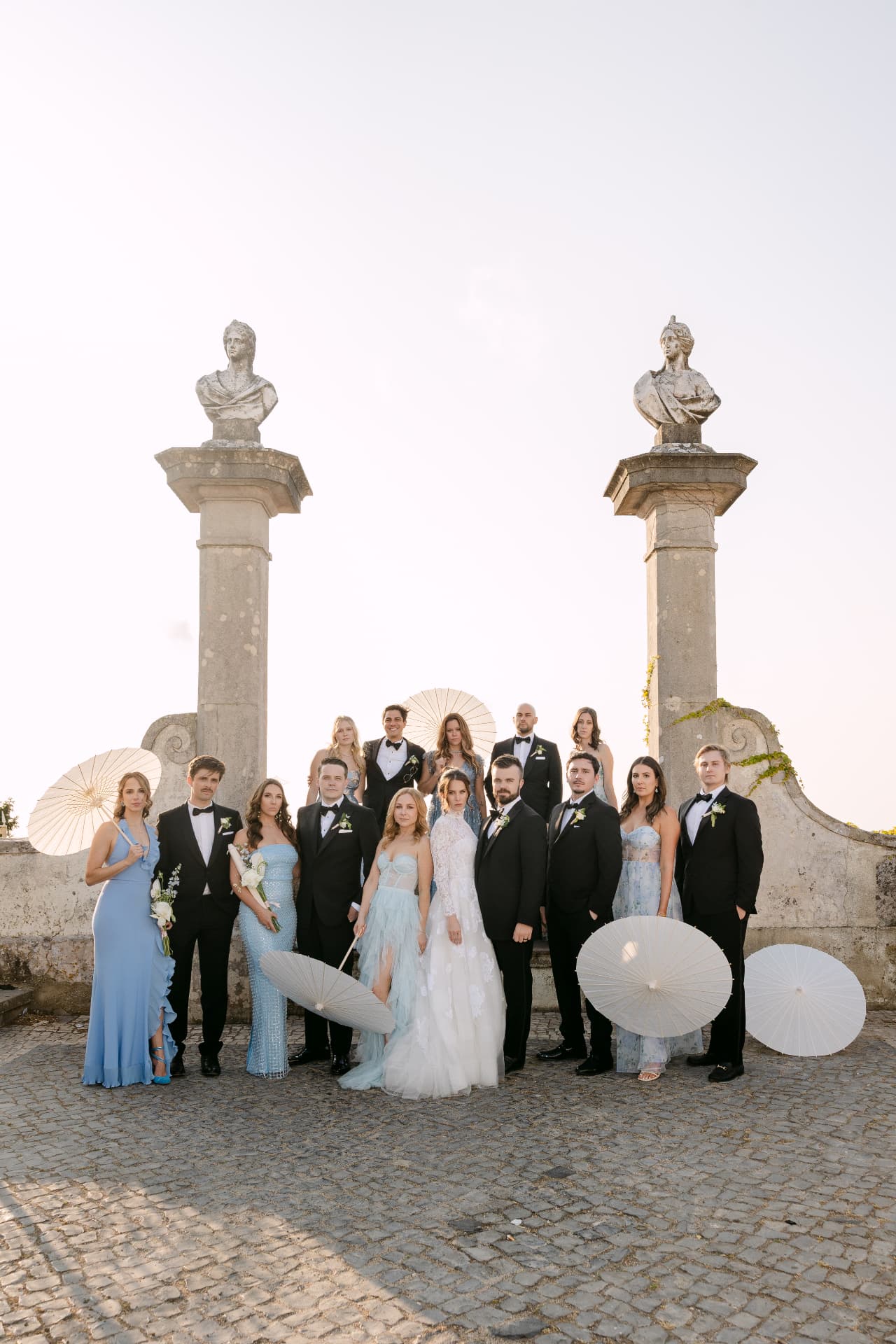 Wedding party gathered at sunset